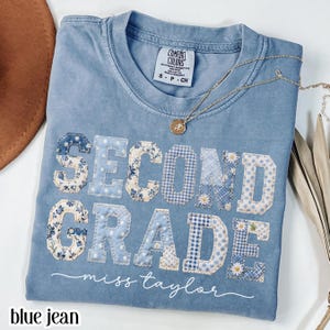 Blue jean Comfort Colors graphic t-shirt with blue patchwork “SECOND GRADE Miss Taylor” lettering, personalized teacher shirt, cute elementary educator tee, back to school outfit, classroom apparel, teacher appreciation gift, women’s casual graphic t-shirt