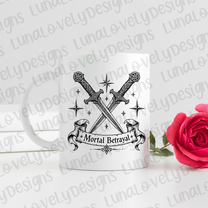 May include: White ceramic mug featuring a crossed swords design with the text "Mortal Betrayal" on a banner. The design is in black and gray, with star accents. A red rose is visible in the background.
