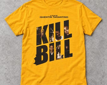 May include: A mustard yellow short-sleeve t-shirt featuring the black text "A FILM BY QUENTIN TARANTINO" above a large "KILL BILL" graphic. The letters contain small black and white photographic portraits of various characters from the film.