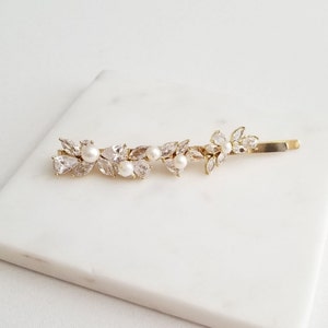 Cubic zirconia bobby pin with freshwater pearls for bride. Available in silver, gold and rose gold.