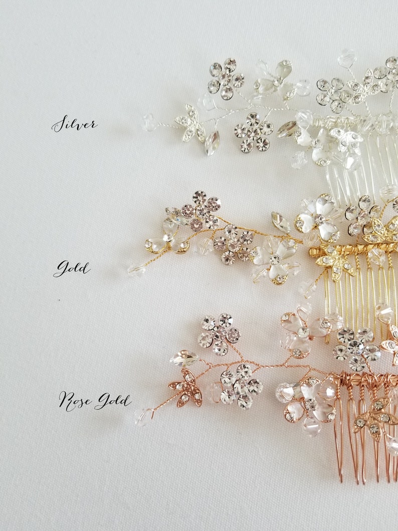 Silk flower bridal hair comb with rhinestones and metal leaves. Available in silver, gold and rose gold with five different flower color options.