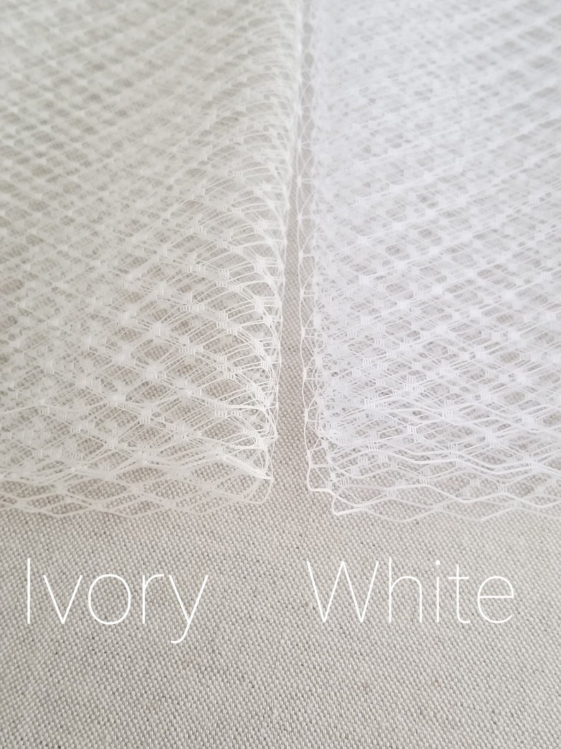Birdcage veil for bride on her wedding day. Made of  french netting with a metal comb. Ivory or white available.