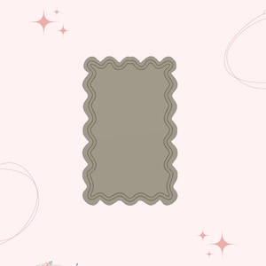 May include: A digital STL file for a cookie cutter. The design is a rectangular shape with a wavy border. The text "STL File" is at the top, and "Digital Purchase" is at the bottom. The background is a light pink colour.