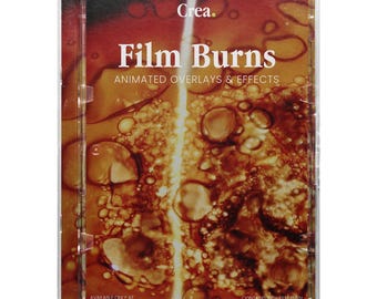 Puede incluir: Una funda de plástico transparente que contiene un disco con el título "Film Burns". El fondo presenta un diseño abstracto marrón y naranja con burbujas y una raya de luz vertical. También se ve el texto "Animated Overlays & Effects".