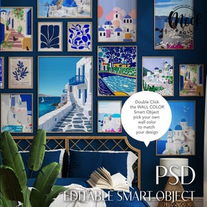May include: A mockup of a bedroom interior design with a blue wall and a bed with blue bedding. The wall is decorated with a gallery of framed prints featuring colorful illustrations of Greek islands and buildings. The text "Double Click the WALL COLOR Smart Object pick your own wall color to match your design" is visible in the image.
