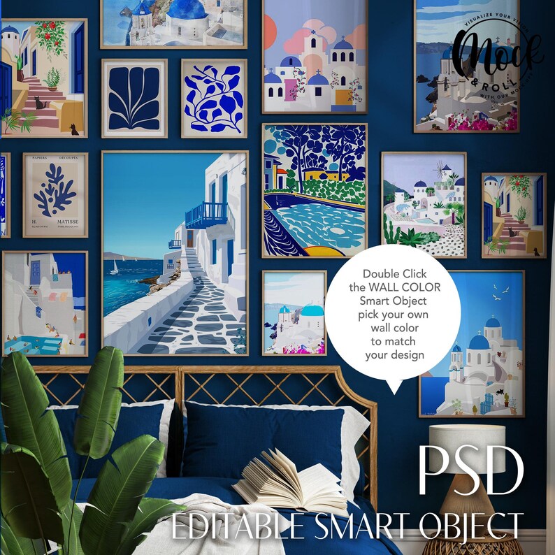 May include: A mockup of a bedroom interior design with a blue wall and a bed with blue bedding. The wall is decorated with a gallery of framed prints featuring colorful illustrations of Greek islands and buildings. The text "Double Click the WALL COLOR Smart Object pick your own wall color to match your design" is visible in the image.