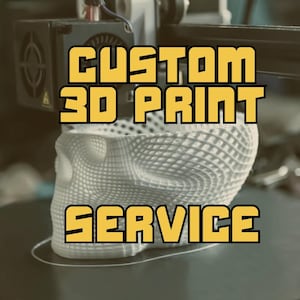 May include: A 3D printed skull model is being printed on a 3D printer. The text "CUSTOM 3D PRINT SERVICE" is displayed in yellow letters on a black background.