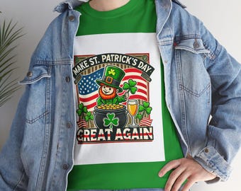 May include: Green t-shirt with a white graphic of a leprechaun holding a pot of gold and a glass of beer. The graphic also includes an American flag and the text "Make St. Patrick's Day Great Again."