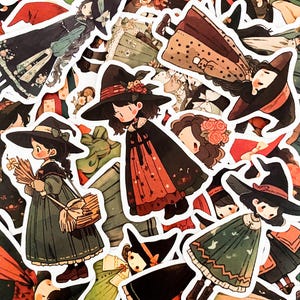 May include: A set of colorful witch stickers with various designs. The stickers feature witches wearing hats and dresses with floral patterns. Some stickers have a whimsical, cartoon-like style, while others have a more realistic look.
