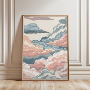 May include: A framed art print featuring a stylized depiction of clouds. The artwork showcases a palette of soft pinks, blues, and creams, with detailed line work creating a textured effect. The print is encased in a simple wooden frame, suitable for home decor.