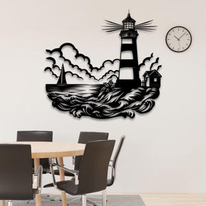 May include: Black and white silhouette wall art featuring a lighthouse, sailboat, and waves. The lighthouse has a striped design and is surrounded by clouds.