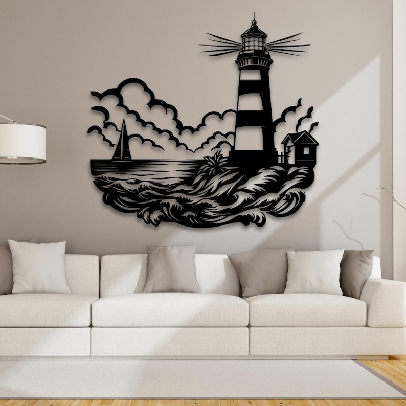 May include: Black metal wall art featuring a lighthouse with a striped tower, a sailboat, and waves crashing against the shore. The scene is set against a backdrop of clouds.