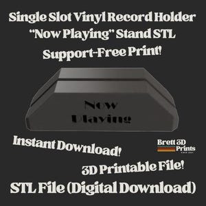 May include: A dark gray single-slot vinyl record holder with the text "Now Playing" on the front. The image also includes the text "Instant Download!" and "3D Printable File!" on a black background.