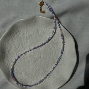 purple and pink beaded necklace