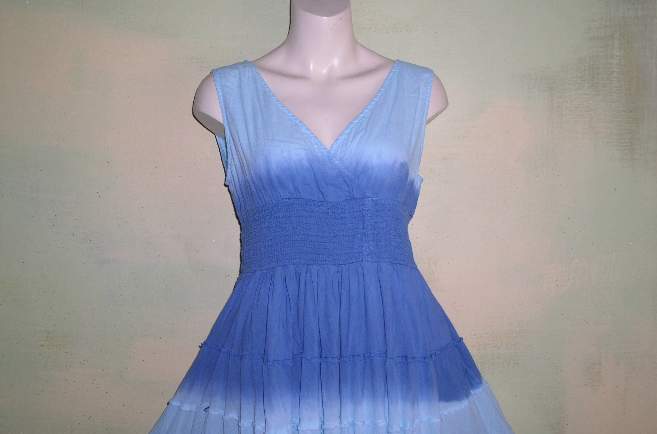 blue circle dress Blue dress with circle skirts. Golden color detail in neckline GUNTINA