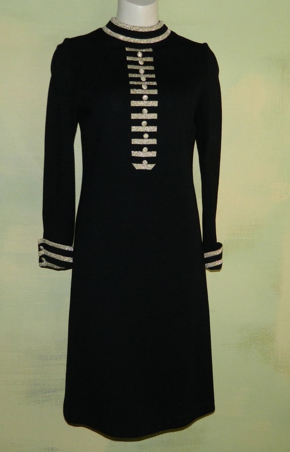 black dress with gold stripes
