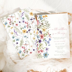 A Little Wildflower baby shower invitation template featuring delicate wildflower illustrations and editable text fields.