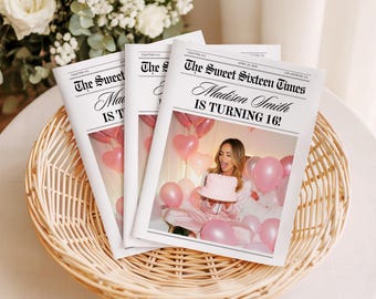 May include: Three newspaper-style invitations in a wicker basket. The headlines read "The Sweet Sixteen Times" and "Madison Smith IS TURNING 16!" with a photo of a person holding a cake. Pink heart and round balloons are in the background.