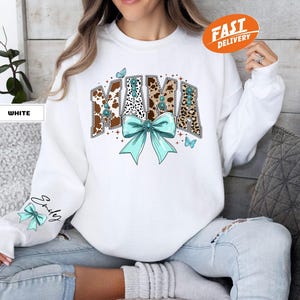 Personalized Coquette Western Mama Sweatshirt, Cowgirl Mom Gift, Custom Name Sleeve, Mother’s Day Country Gift, Howdy Mama Crewneck
