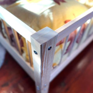 Toddler bed frame close up pine wood texture