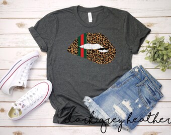 Leopard Print Biting Lips with Red and Green Ribbon T-shirt | Designer T-shirt