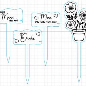 Puede incluir: Tres letreros de madera en blanco y negro con mangos de palo. Los letreros dicen "Beste Mama der Welt", "Mama ich hab dich lieb" y "Danke".