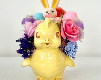 Vintage Easter assemblage arrangement flocked bunny in yellow ceramic chick planter pinks purples blues yellow