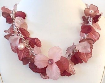 Necklace of vintage lucite plastic flower beads pink mauve burgundy on vintage pink chain