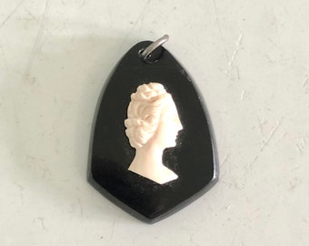 Vintage pendant black and off white lucite plastic cameo pendant midcentury
