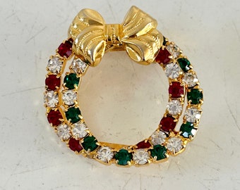 Vintage Christmas pin brooch Christmas double wreath in red green and clear rhinestones with gold tone bow signed by Eisenberg Ice