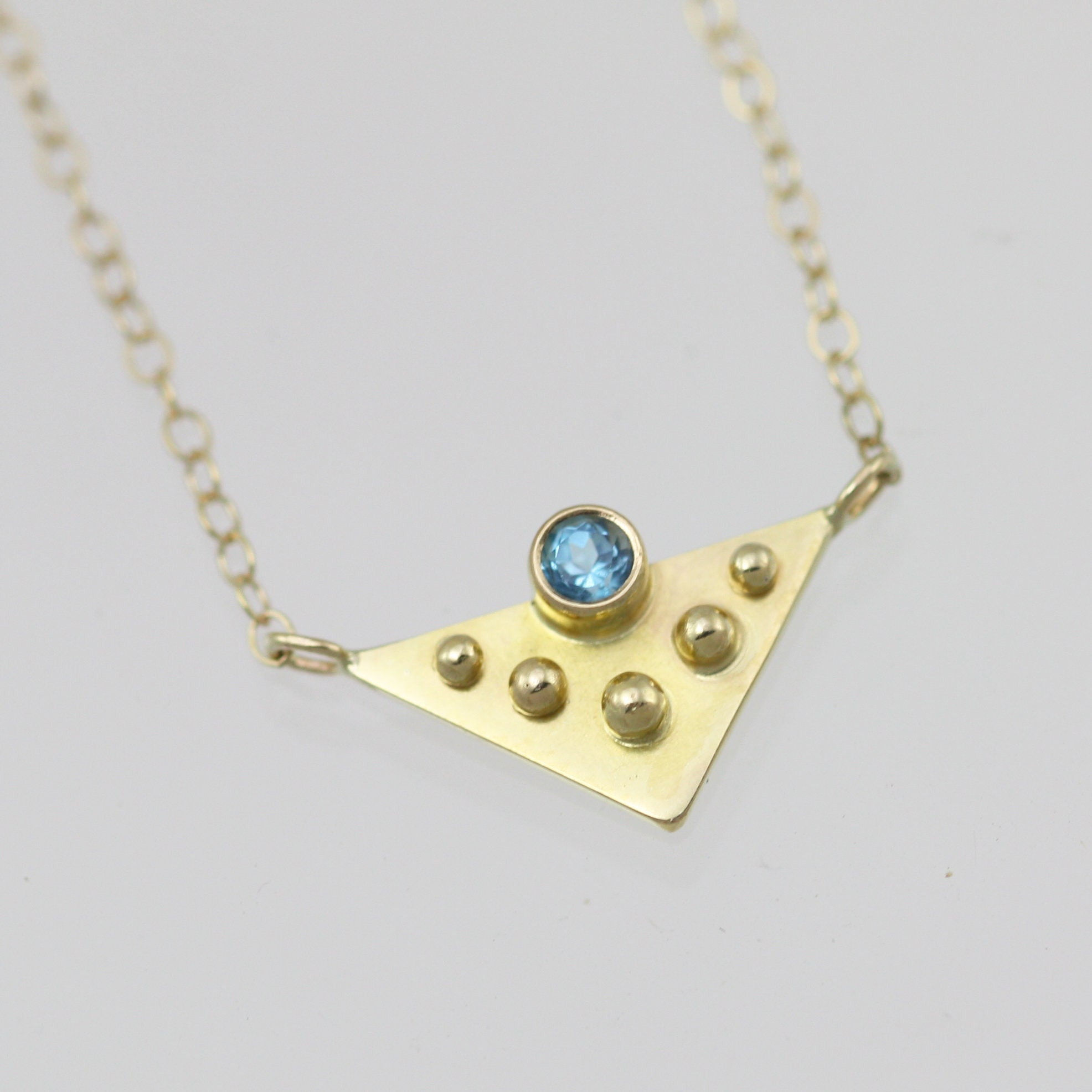 14Kイエローゴールドの5つのドットとブルートパーズのゴールド