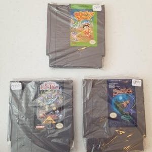 Nintendo Games (NES) with instruction manuals and case