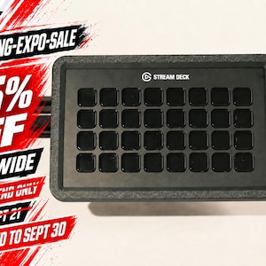 May include: A black Stream Deck control console featuring a grid of thirty-two square buttons, mounted on a black horizontal rail. The image includes promotional text stating SIM-RACING-EXPO-SALE, 15% OFF, STORE WIDE, THIS WEEKEND ONLY, ENDS SEPT 21, and EXTENDED TO SEPT 30.