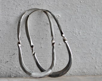 twisted oval sterling silver hoop, horseshoe hoop, stirrup hoop, endless self locking hoop, medium size, eco friendly jewelry