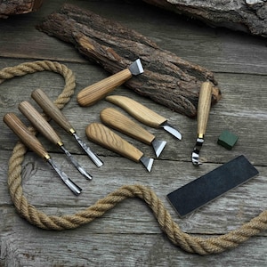 9-Piece Carving Tool Set. 52100 Carbon Steel Blades, Ash Wood Handles, Leather Sheath. Wood Carving Tools with Sharpening Board for Beginner