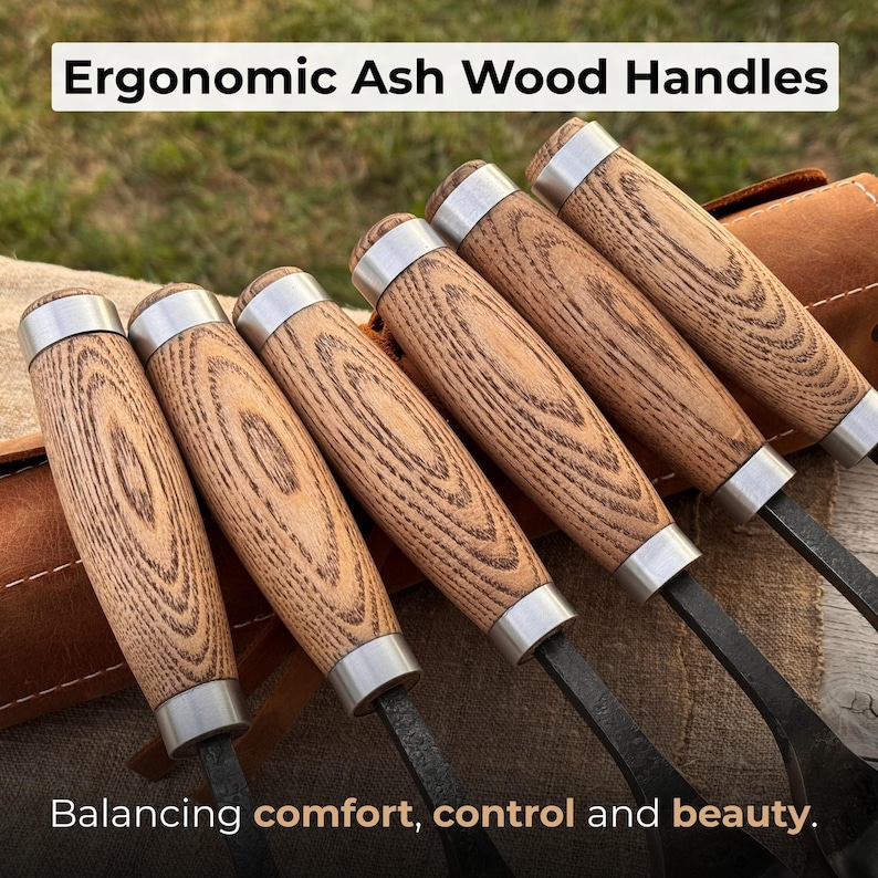 May include: A set of six tools with ergonomic ash wood handles. The handles are light brown with a wood grain pattern and are capped with silver metal. The text "Ergonomic Ash Wood Handles" and "Balancing comfort, control and beauty" are visible.