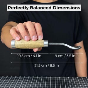 May include: A carving knife with a wooden handle and a curved blade. The handle is 4.1 inches long, the blade is 3.5 inches, and the total length is 8.5 inches. The text "Perfectly Balanced Dimensions" is at the top.