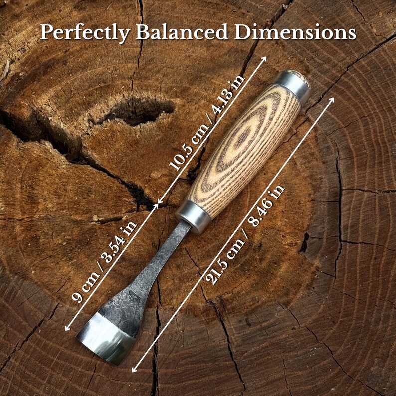 May include: A metal chisel with a light-colored wood handle featuring a dark grain pattern. The tool has a total length of 8.46 inches, a handle length of 4.13 inches, and a blade length of 3.54 inches. The text Perfectly Balanced Dimensions is visible.