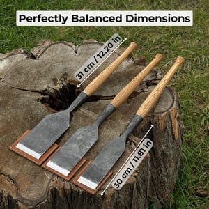 Three timber slick chisels on a stump with labeled dimensions, large chisels for flattening and joinery finishing