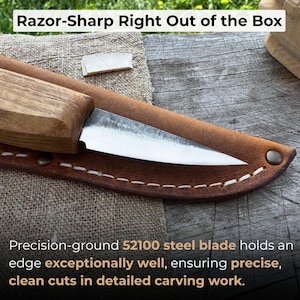 Close-up of polished carbon steel blade showing hand-forged texture, sharp edge, and refined bevel ideal for detailed wood carving.