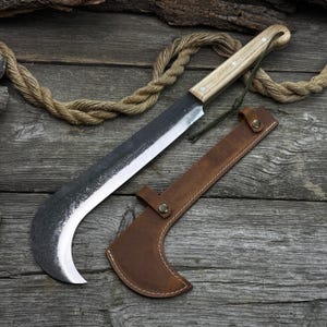 Camping Machete. Razor Sharp Blade. Hand Forged from Hardened Carbon 52100 Steel, Ergonomic Ash Handle, with Leather Sheath. Chopping Knife