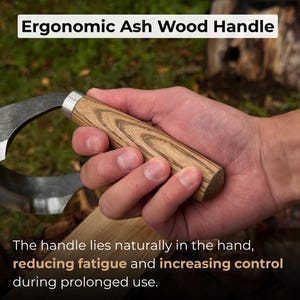 May include: A curved blade tool with an ergonomic ash wood handle. The handle is a light brown color with a silver metal ferrule. The text "Ergonomic Ash Wood Handle" is at the top of the image.