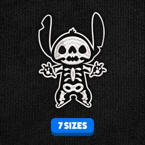 May include: White embroidered design of a skeleton Stitch character from the Disney movie Lilo & Stitch. The design is on a black background and says "7 SIZES" at the bottom.