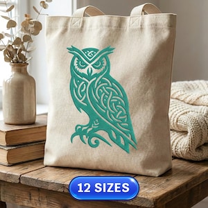 May include: Beige tote bag featuring a teal owl design with Celtic knot patterns. The bag has two handles and is made of a sturdy fabric. The text "12 SIZES" is displayed on a blue oval at the bottom.