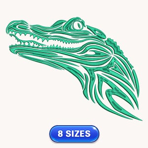 May include: An embroidery design of an alligator head in profile, rendered in shades of teal green with intricate, flowing line work. Below the alligator head, a blue oval button contains the white text 8 SIZES, indicating available options.