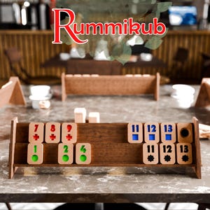 May include: A wooden Rummikub game rack with tiles showing numbers 1, 2, 4, 7, 8, and 11-13. The tiles are in a variety of colors, including red, blue, green, and black.