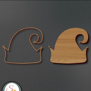 May include: Two wooden elf hat designs. One is a line drawing, the other is filled in with wood grain. The text "Elf Hat" is at the top. The bottom of the image has the text "AI | DXF | EPS | PDF | SVG".