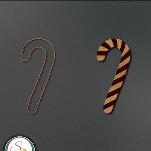 May include: Two candy cane designs are displayed against a dark gray background. One is a wireframe outline, and the other is a striped pattern in red and wood tones. The text "Candy Cane" is at the top.