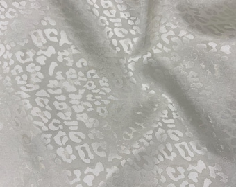 Cream Leopard Jacquard Lining Fabric: Viscose Acetate Blend