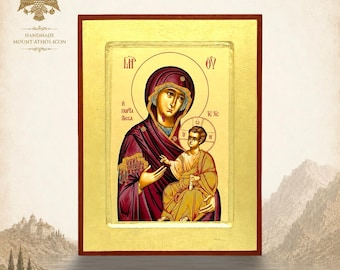 May include: A rectangular religious icon featuring a gold-leaf background with a central depiction of the Virgin Mary in a deep purple robe holding the Christ child in gold and white robes. The text MP OY and other Greek lettering are visible.